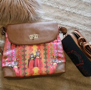 Dressy yet classy bag. Get the other one free (as shown in the pics)